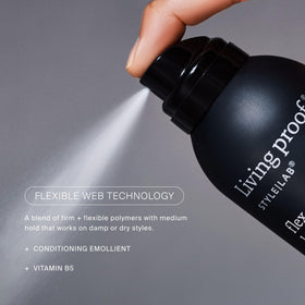 Living Proof applied to damp hair during styling with heat protection benefit