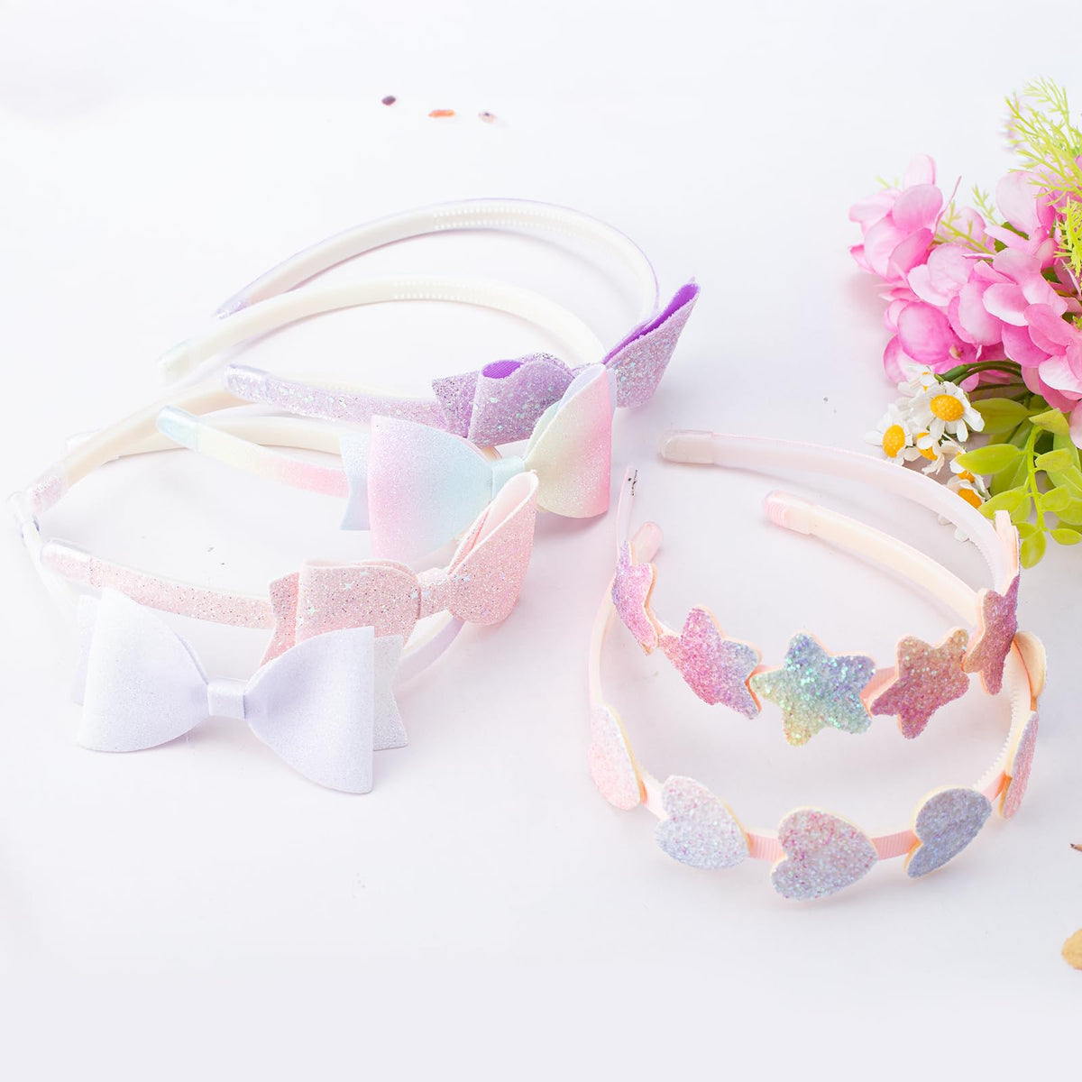 Lizioo detail of bow shape sewn on band showing decorative charm