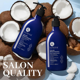 L LUSETA bottles styled on bathroom shelf suggesting salon care at home