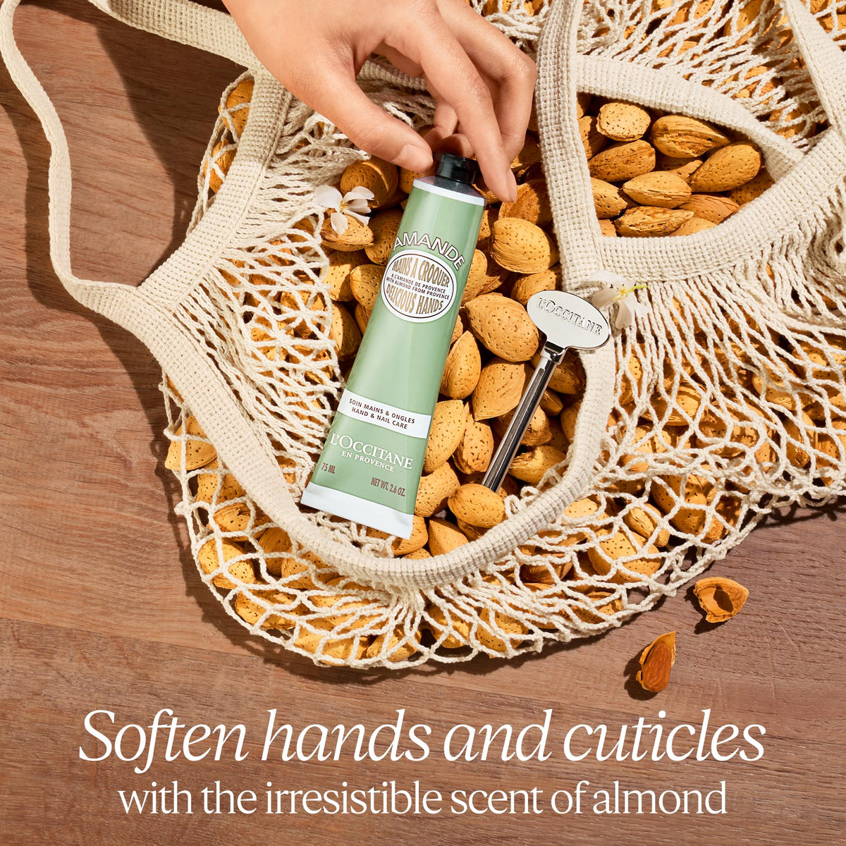 L'OCCITANE cream dabbed on hand demonstrating quick absorption and softness
