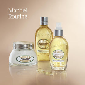 L'OCCITANE Almond Shower Oil bottle in a styled bathroom conveying indulgent shower ritual
