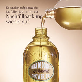 Refill bottle next to a hand and pump bottle showing L'OCCITANE size and refill convenience
