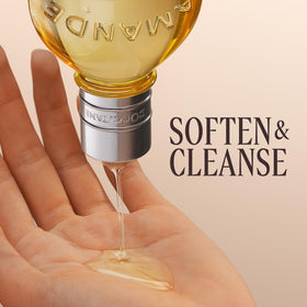 L'OCCITANE bottle open with oil pouring demonstrating easy dispensing