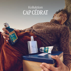 L'OCCITANE Cap Cédrat bottle next to everyday items for size clarity