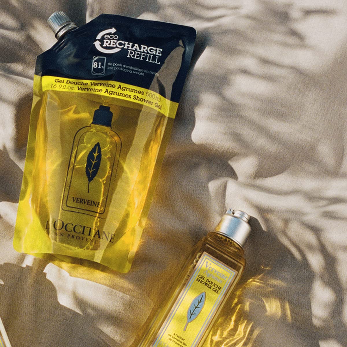 Pouch being poured into a bottle illustrating L'Occitane easy refill