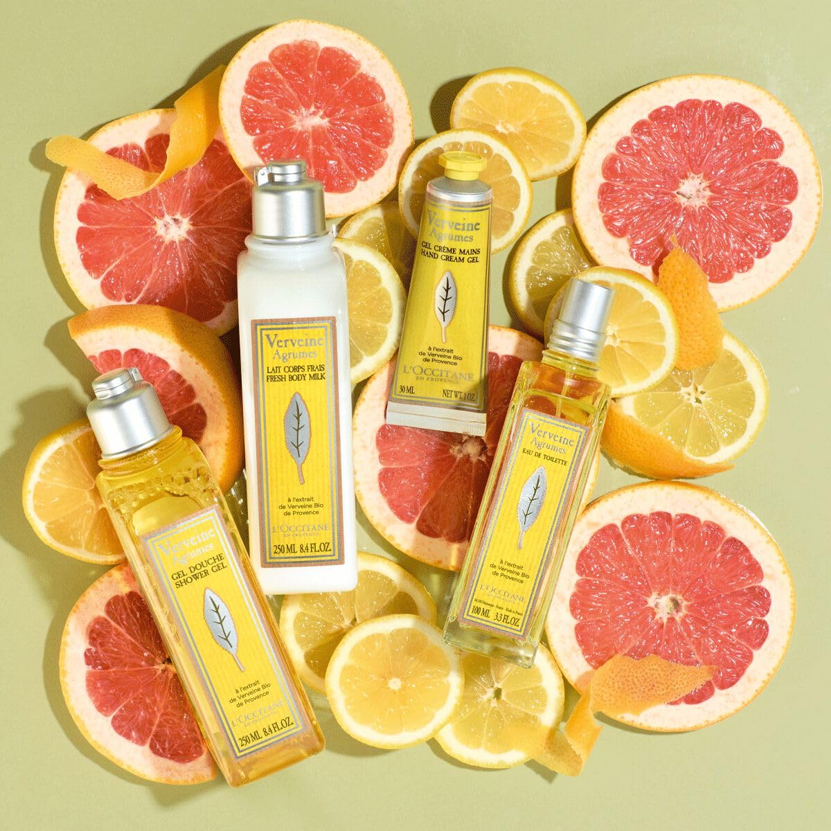 L'OCCITANE size comparison beside everyday items showing 8.4 fl oz portability