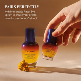 L'OCCITANE product on bedside table illustrating overnight skincare routine benefit