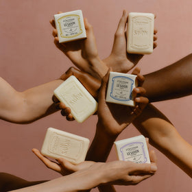 L'OCCITANE shea lavender bar staged in a bathroom setting for daily routine