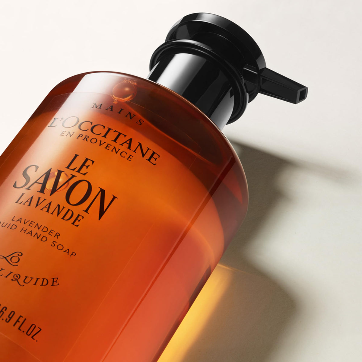 L'OCCITANE label detail focusing on palm-oil-free and traditional cauldron method