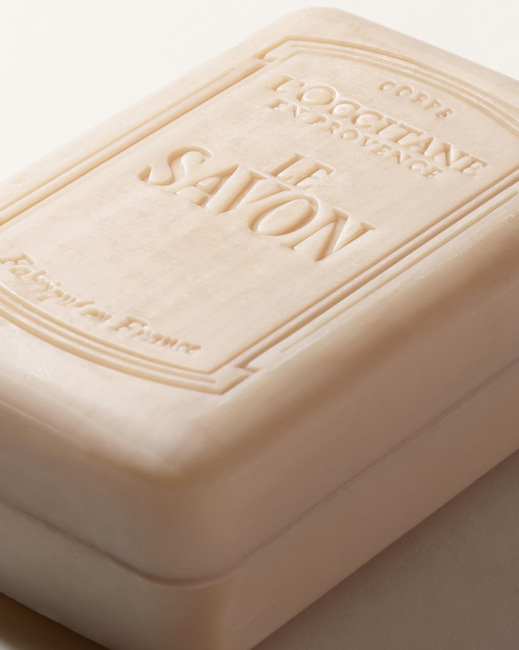 L'OCCITANE soap beside ruler showing 8.80 fl oz size clarity