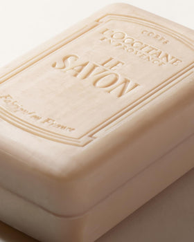 L'OCCITANE soap beside ruler showing 8.80 fl oz size clarity
