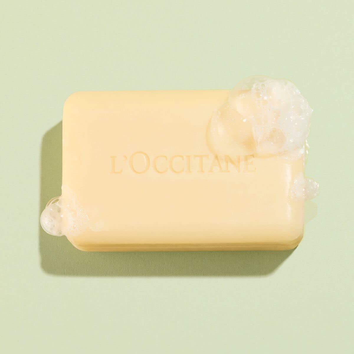 L'OCCITANE shea verbena bar close-up of creamy texture, highlighting moisturizing shea extract