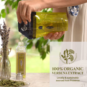 L'OCCITANE refill pictured in shower setting offering an uplifting aromatic experience