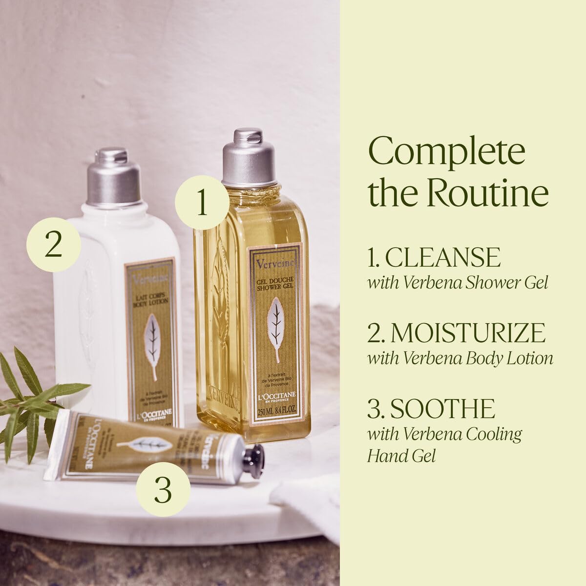 L'OCCITANE bottle held in hand showing 8.4 fl. oz scale