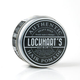 Lockhart's pomade on hands demonstrating easy warmth-and-apply benefit