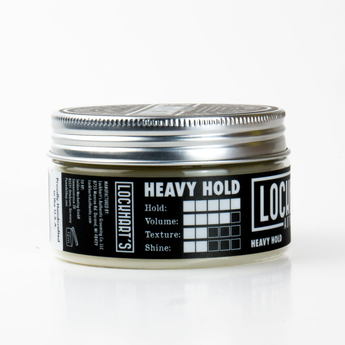 Lockhart's close-up texture of pomade highlighting dense, workable consistency