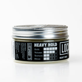 Lockhart's close-up texture of pomade highlighting dense, workable consistency