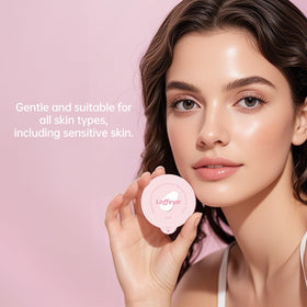 Loffeyo pod warming between fingertips demonstrating melt-to-oil action for easy makeup removal