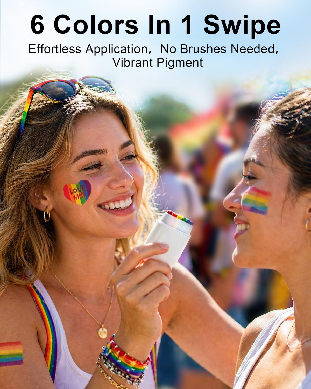 LOGNEW model applying rainbow stripe to cheek offering bold parade-ready face paint