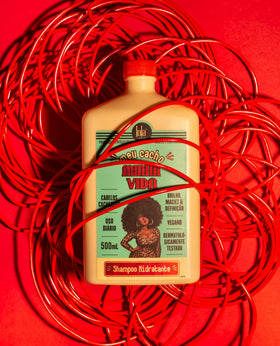 Lola shampoo creamy texture close-up displaying moisturizing formula benefit