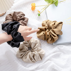 Lolalet scrunchie beside ruler showing 5.9-inch jumbo size clarity