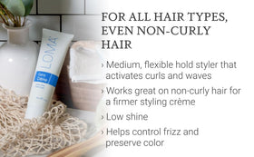 Loma Curvy Crème in palm ready to apply, showing easy dosing and flexible hold benefit