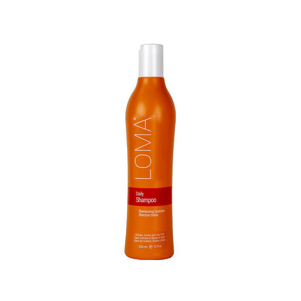 Loma front bottle view showing pump and clear daily shampoo for easy dispensing