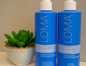 Loma leave-in near pears lifestyle shot highlighting pear aromatherapy