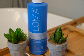 Loma leave-in spray nozzle detail demonstrating easy mist application