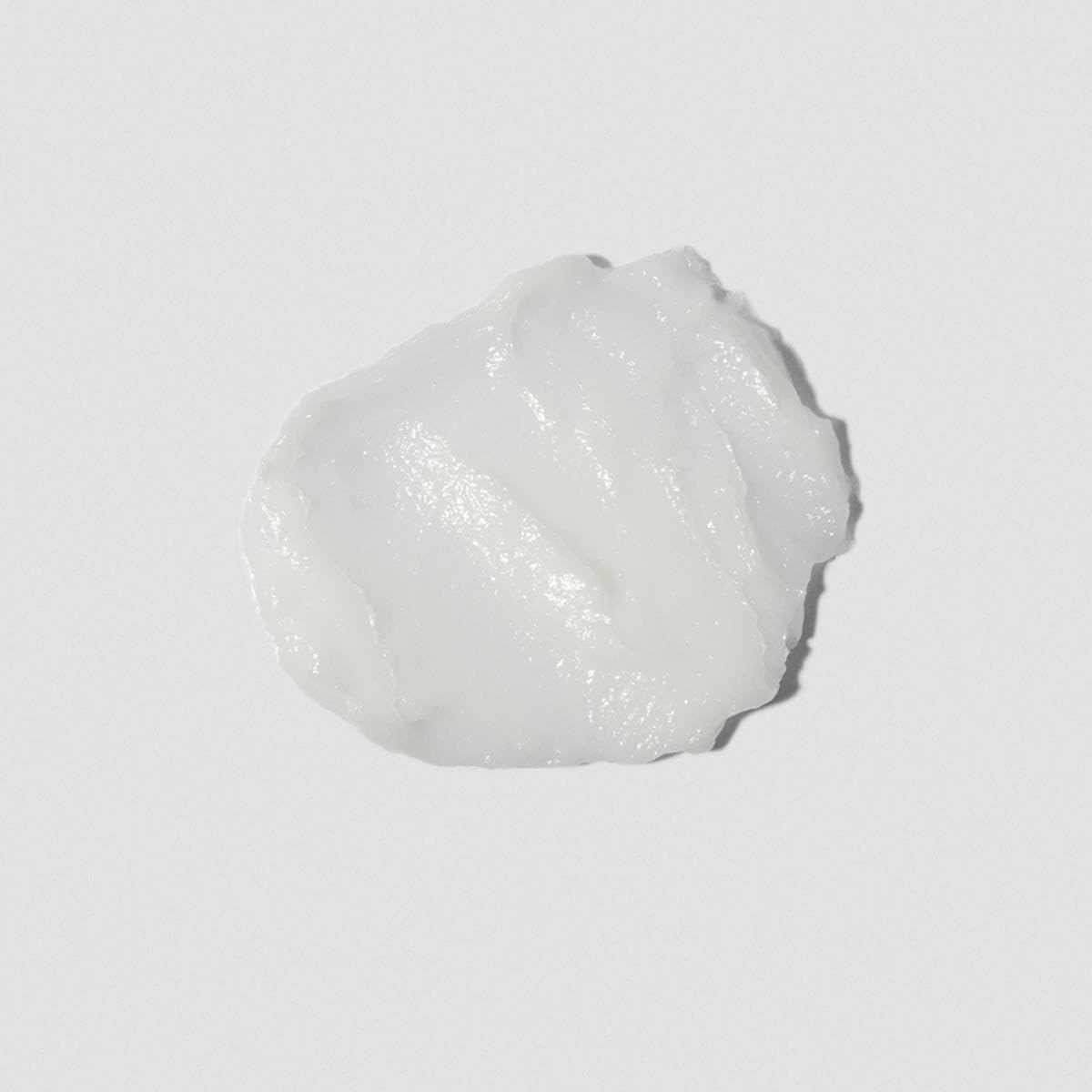 Loma smoothing crème texture close-up highlighting creamy lightweight formula benefit