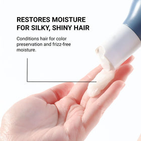 Loma treatment applied to damp hair illustrating easier detangling and shine
