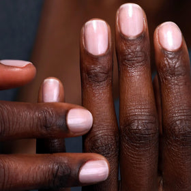 LONDONTOWN applying polish to nails illustrating easy one-step use benefit