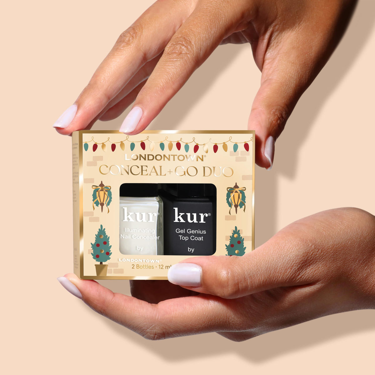 LONDONTOWN kur duo in lifestyle setting on desk showing quick at-home professional-looking manicure