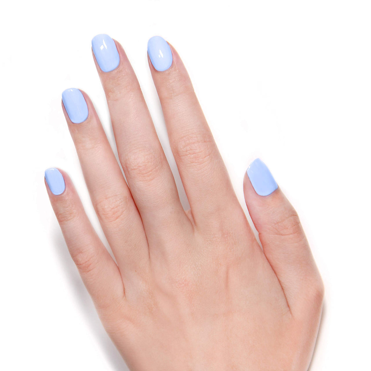LONDONTOWN Lakur Amalfi Love on hands in beach setting showcasing chip-resistant, vibrant color