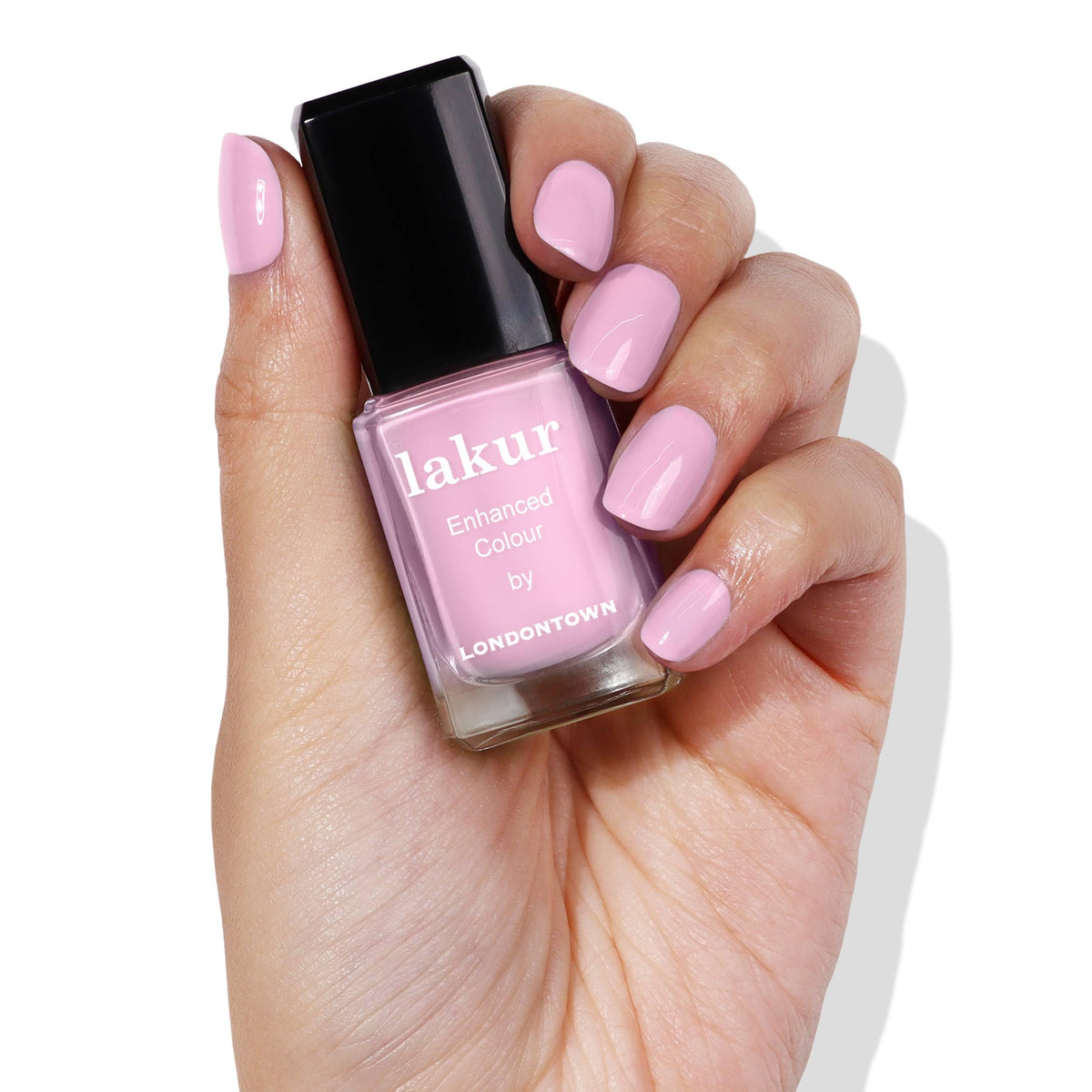 LONDONTOWN brush spreading polish illustrating smooth streak-free application benefit