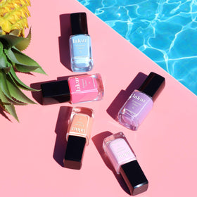 LONDONTOWN Pink Palm flatlay with manicure tools showing salon-style results benefit