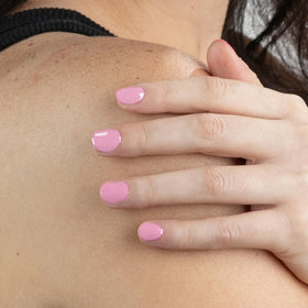 LONDONTOWN painted nails during application demonstrating even coverage benefit