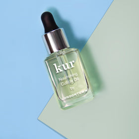 LONDONTOWN set on bathroom vanity suggesting easy at-home nail maintenance