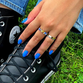 LONDONTOWN manicure in summer setting showcasing durable vibrant color benefit