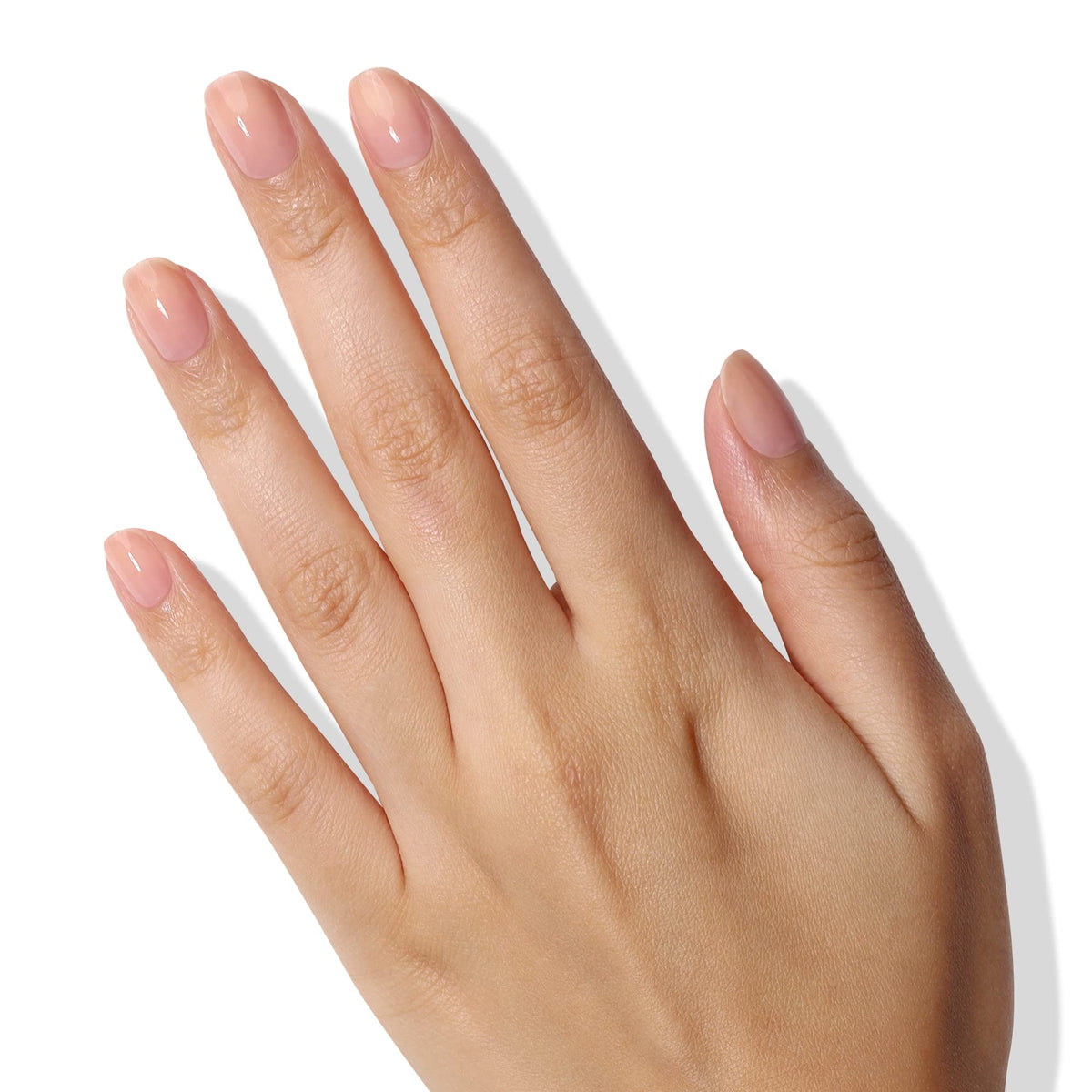 LONDONTOWN manicure lifestyle on table showing polished natural nails