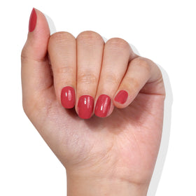 LONDONTOWN polish being applied to nails for a smooth, chip-resistant finish