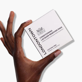 LONDONTOWN used pad being folded for proper disposal and hygiene