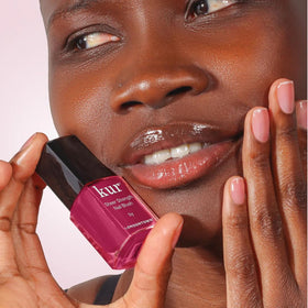 LONDONTOWN product next to ruler showing 0.40 fl oz compact size benefit