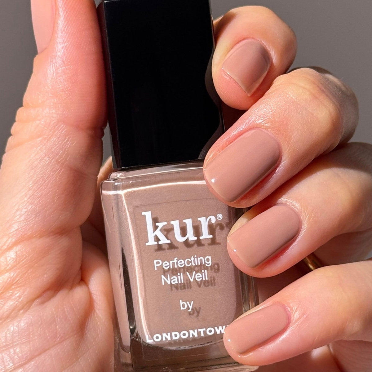 LONDONTOWN texture closeup showing glossy sheer finish