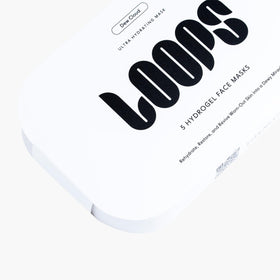 LOOPS five-pack gift box styled in a skincare routine setting for gifting