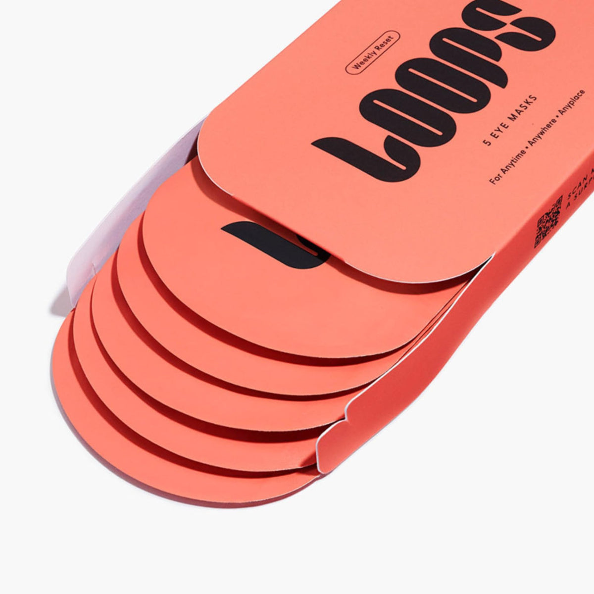 LOOPS mask application under eye demonstrating secure fit and cooling relief