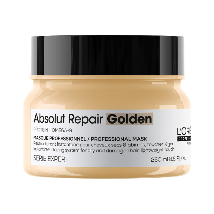 L'Oréal Professionnel bottle front view showing golden mask and professional repair benefit