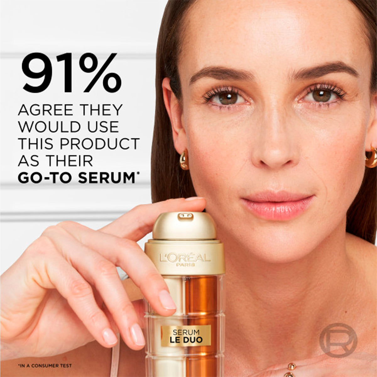 L'Oreal Paris serum dispenser open showing dual-phase pump for precise dosing