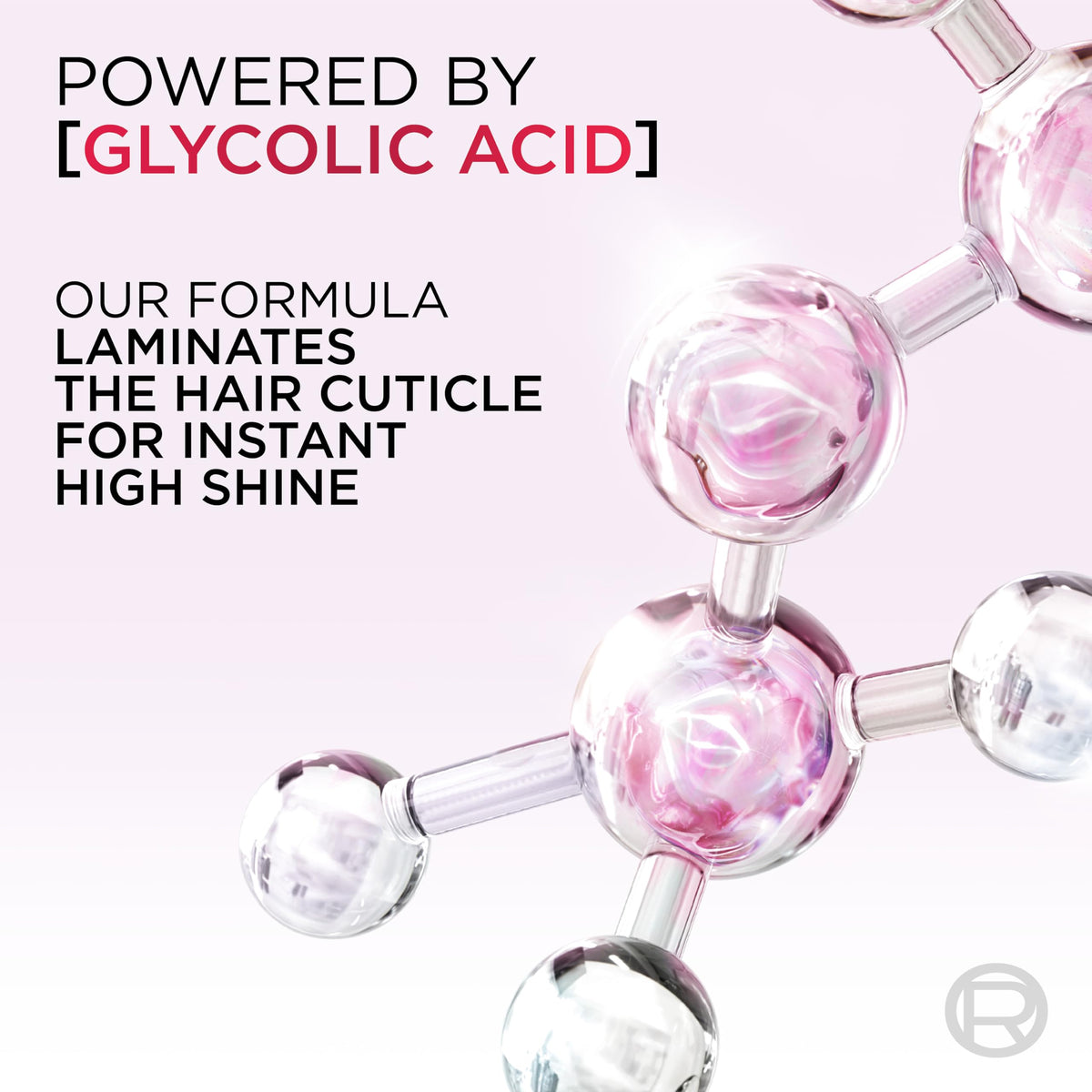L'Oreal Paris paired shampoo and conditioner bottles arranged to show coordinated gloss-boosting routine