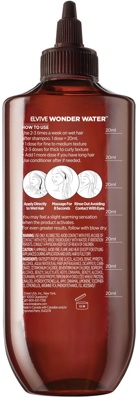 L'Oreal Paris bottle beside notebook showing 6.8 fl oz size and portability